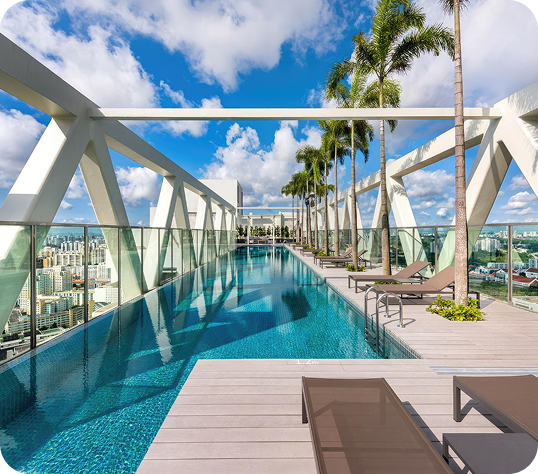 Luxury rooftop infinity pool with palm trees